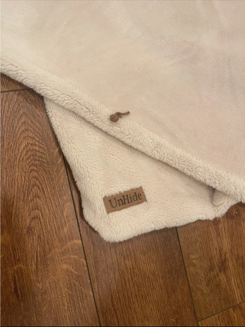 UnHide blanket in cream 60 by 80